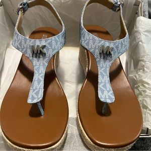 MK wedge sandals with jean logo print.